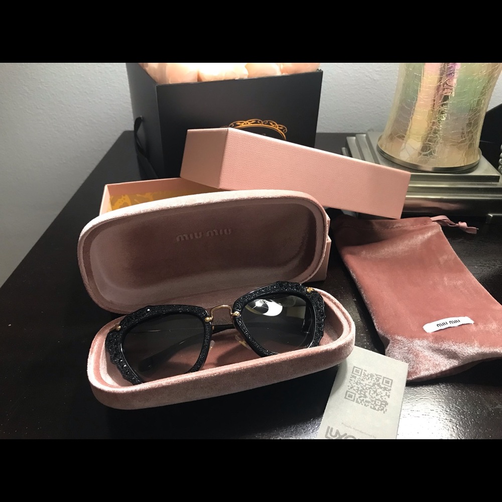 Black Miu Miu sunglasses